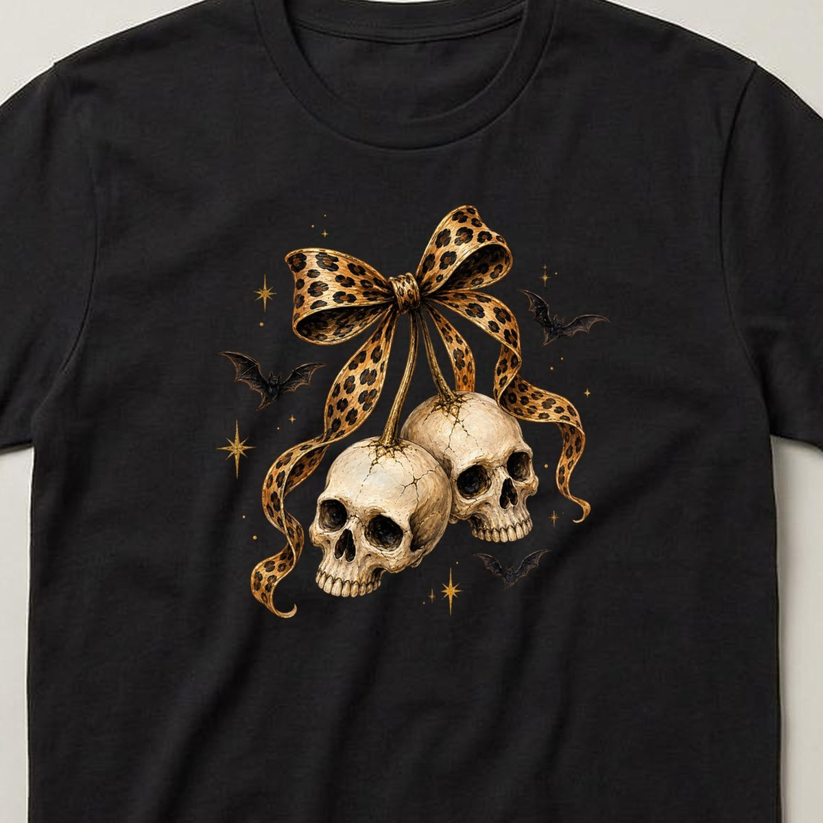 Leopard Bow Two Skulls t-shirt, black, close view of the print